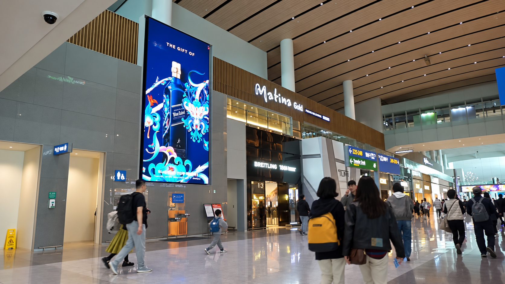 Johnnie Walker Blue Label campaign on a vertical airport duty-free network screen at Incheon Airport Terminal 2